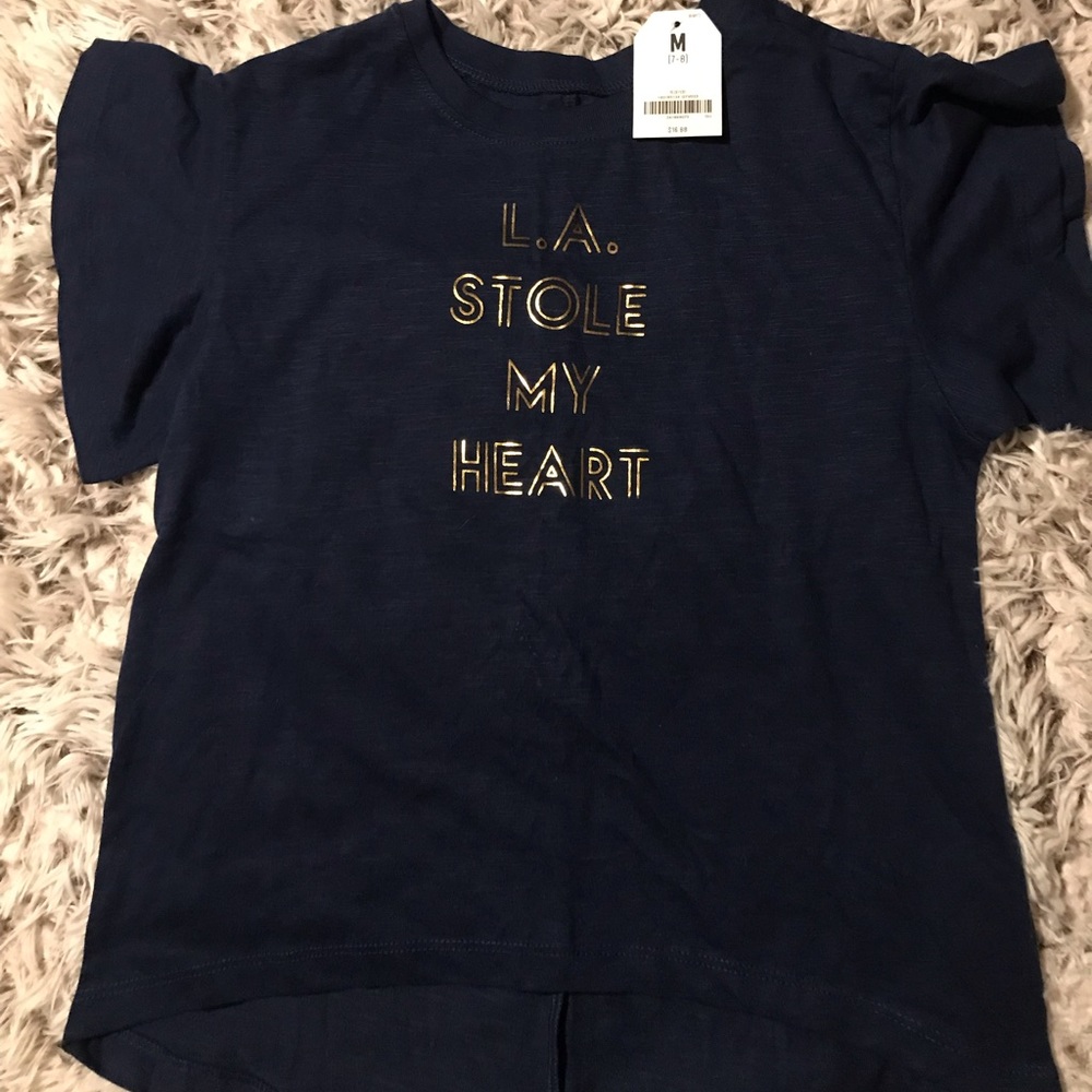 Girls short sleeve shirt .